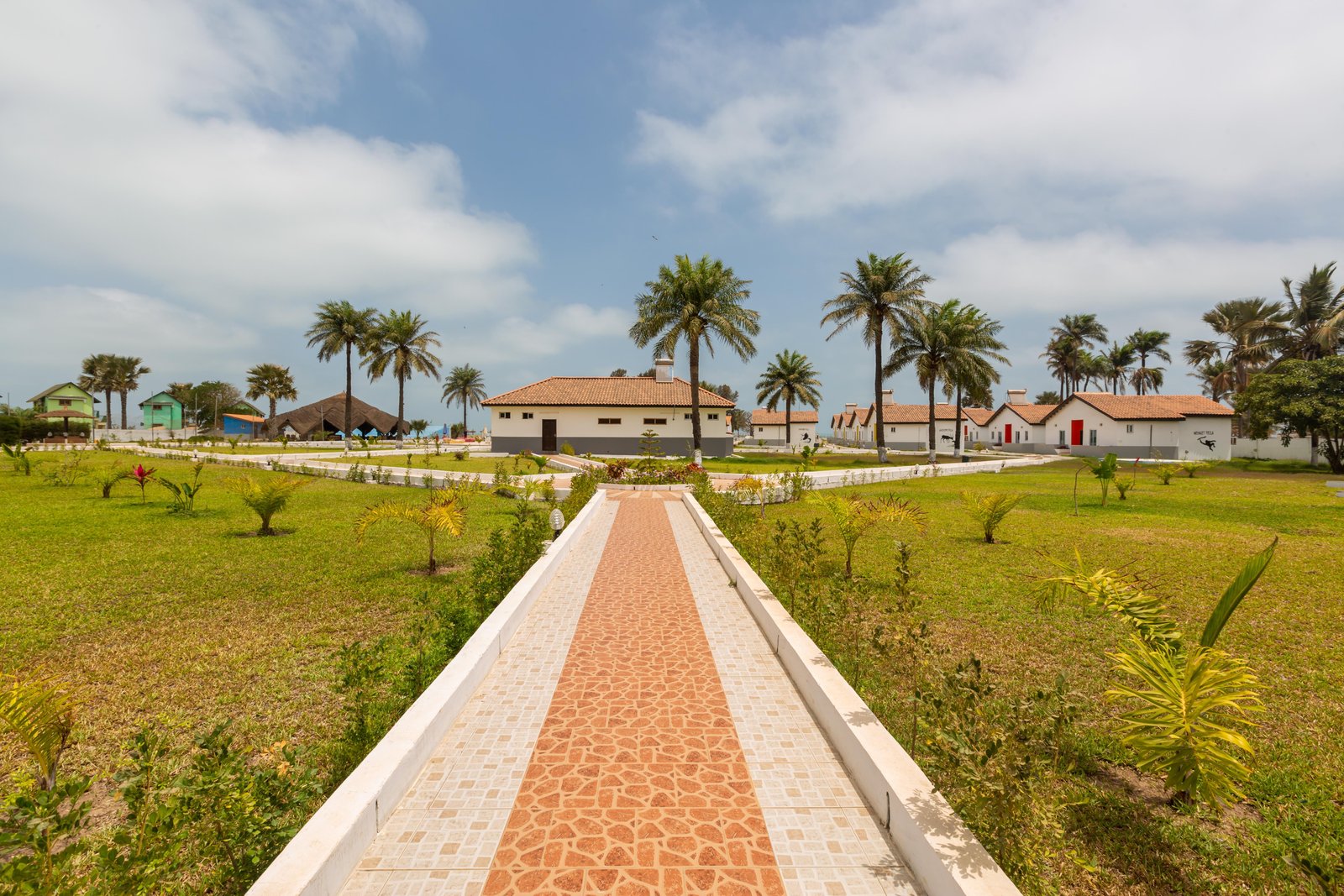 beautiful-pavement-houses-surrounded-by-grassy-fields-captured-gambia-africa