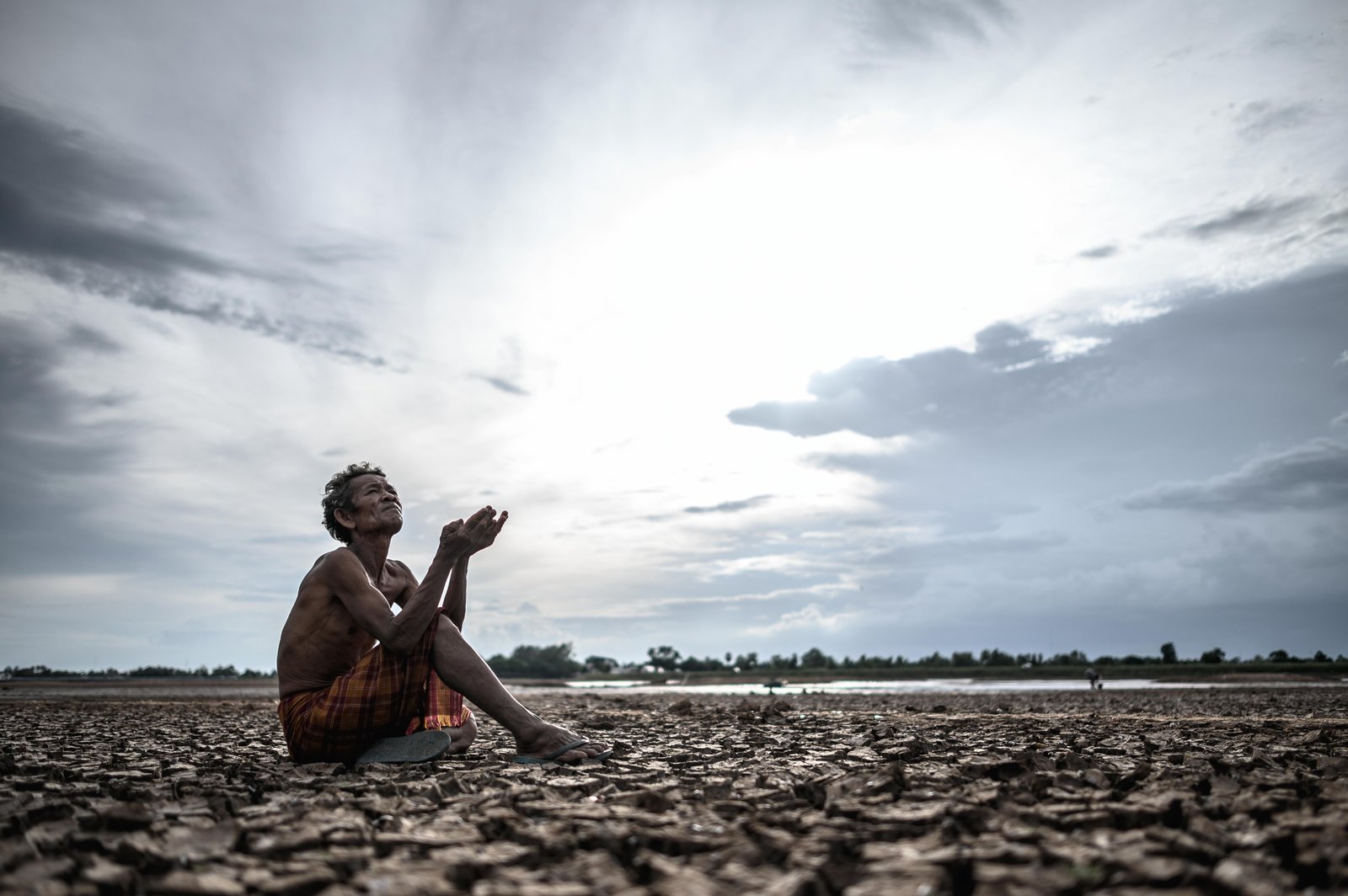 elderly-man-was-sitting-asking-rain-dry-season-global-warming