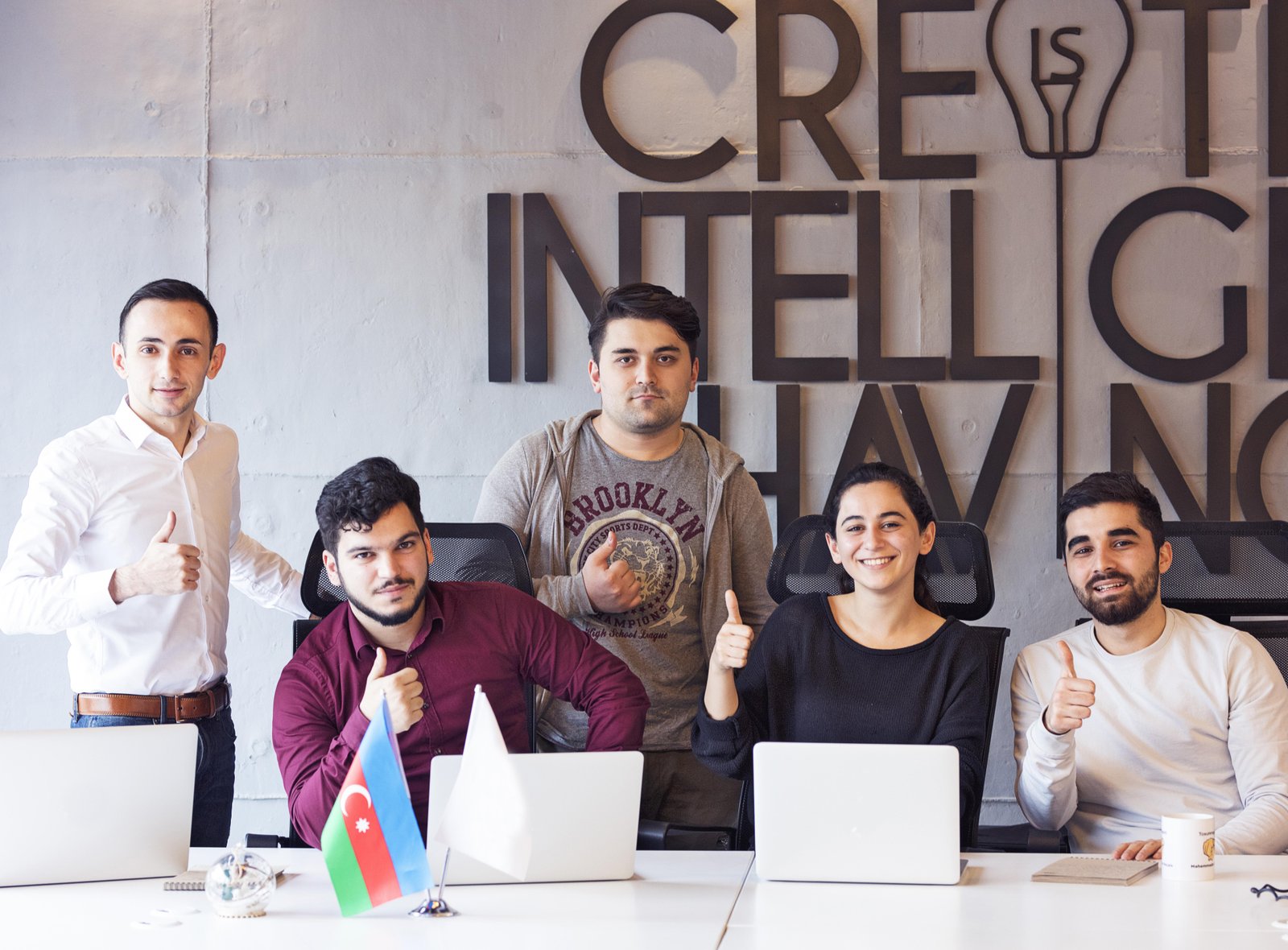 happy-motivated-colleagues-office