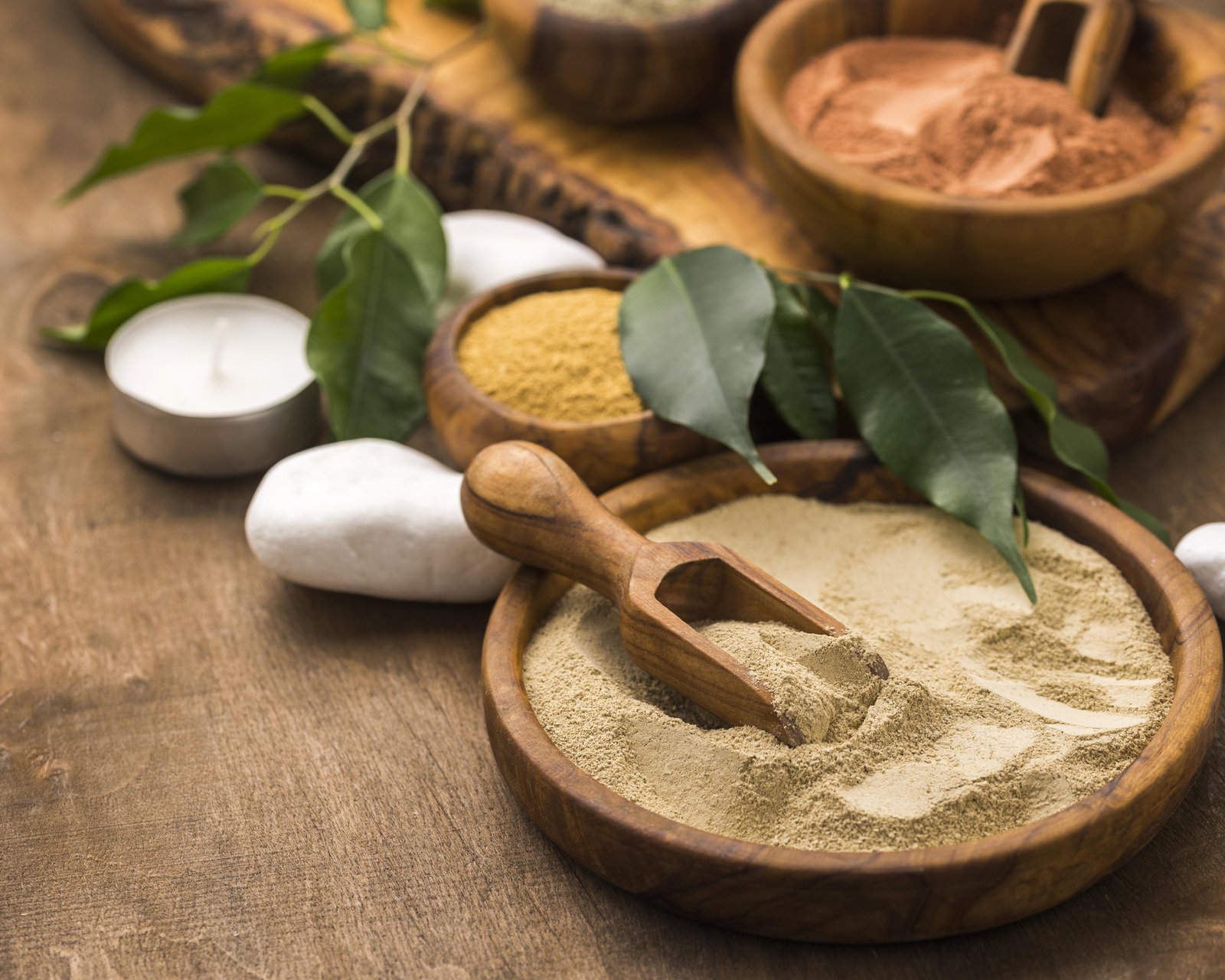 high-angle-selection-fine-powders-bowls-with-leaves-stones