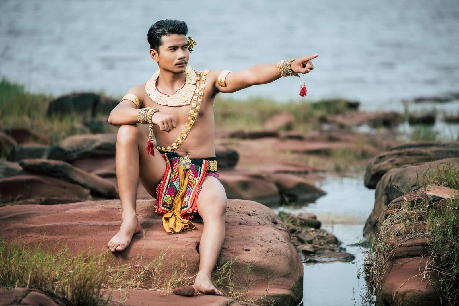 portrait-young-man-traditional-costume-posing-nature-thailand