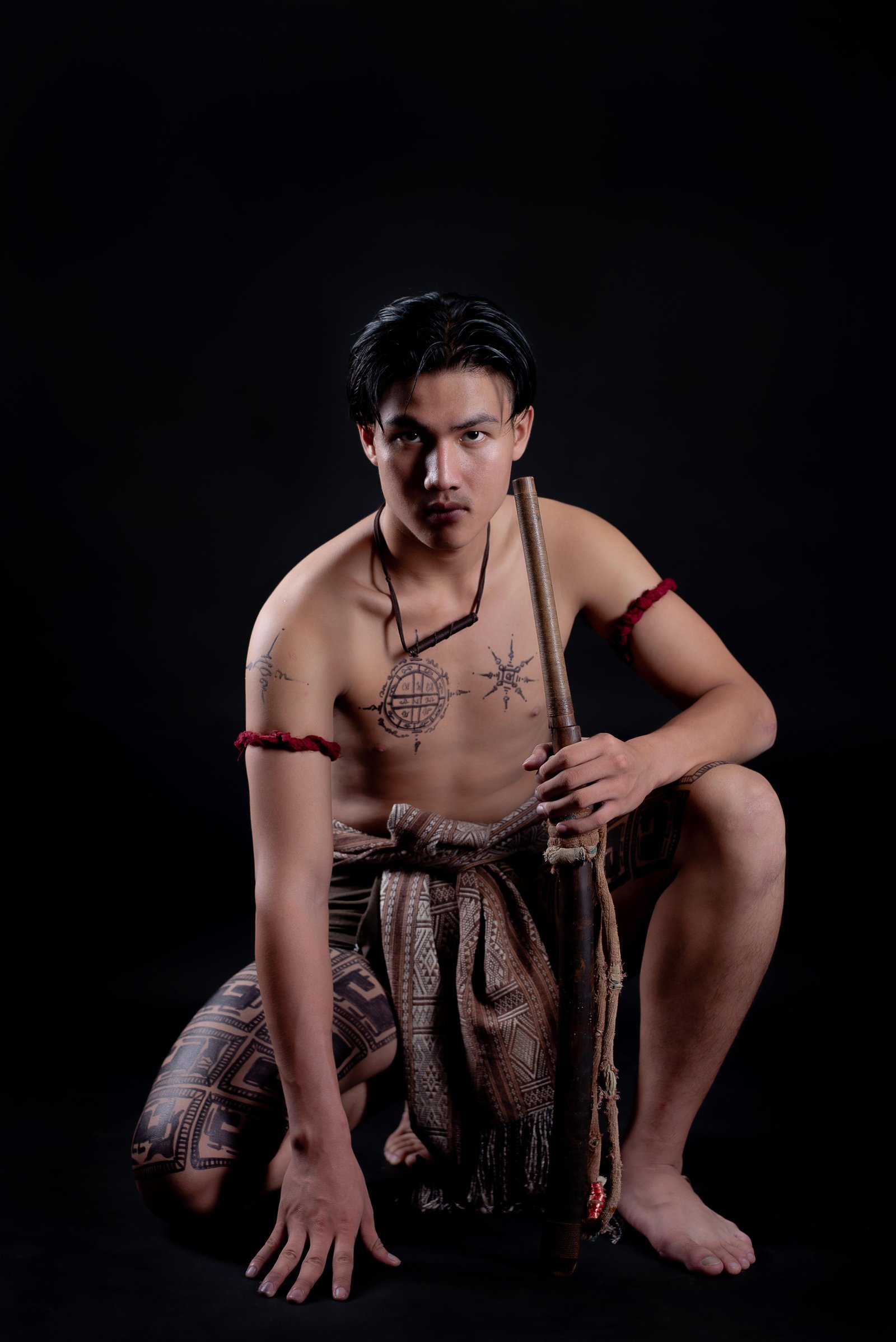 young-thailand-male-warrior-posing-fighting-stance-with-sword
